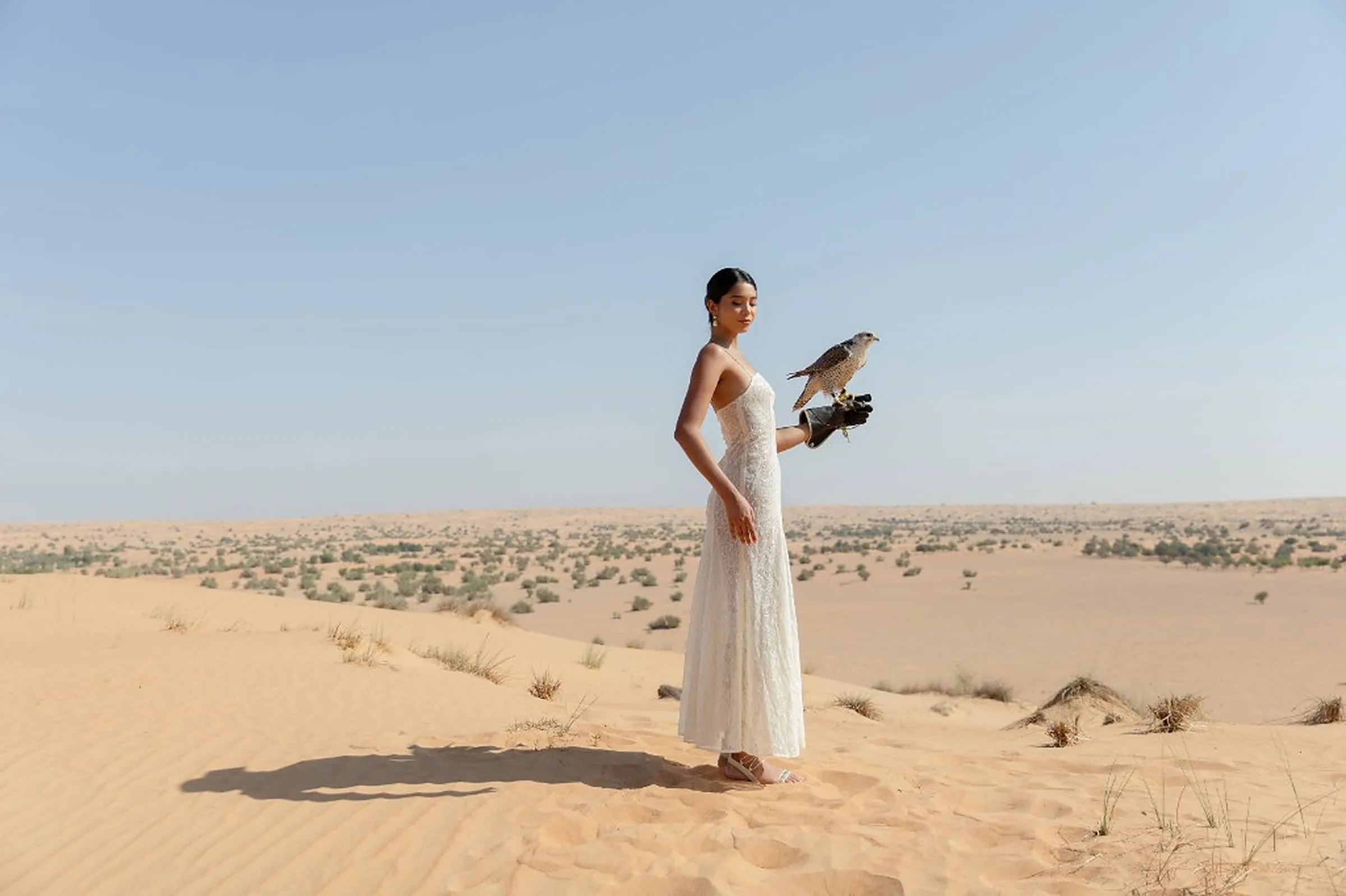 Desert wedding setting at Al Maha Desert Resort, Dubai, at golden hour