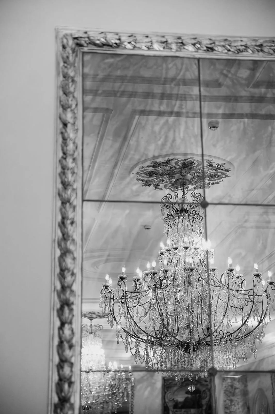 Villa Miani, Rome – crystal chandelier reflected in a mirror, black and white